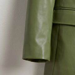 Sleeve cuff detail on smooth verdant green leather blazer