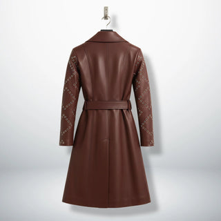 Back view of long maroon leather trench coat with belt and studded sleeves