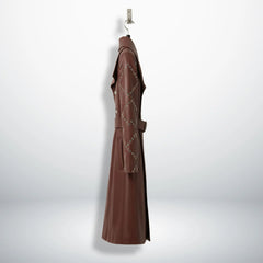 Side profile of long maroon leather trench coat for women