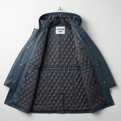 Inside quilted lining of women’s navy leather hooded coat