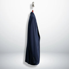 Side profile of single button navy wool blazer for women