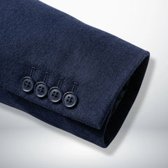 Sleeve cuff detail with four buttons on navy blue wool blazer