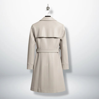 Back view of moonlight silver leather trench coat with storm flap and belt