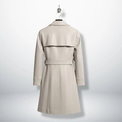 Back view of moonlight silver leather trench coat with storm flap and belt