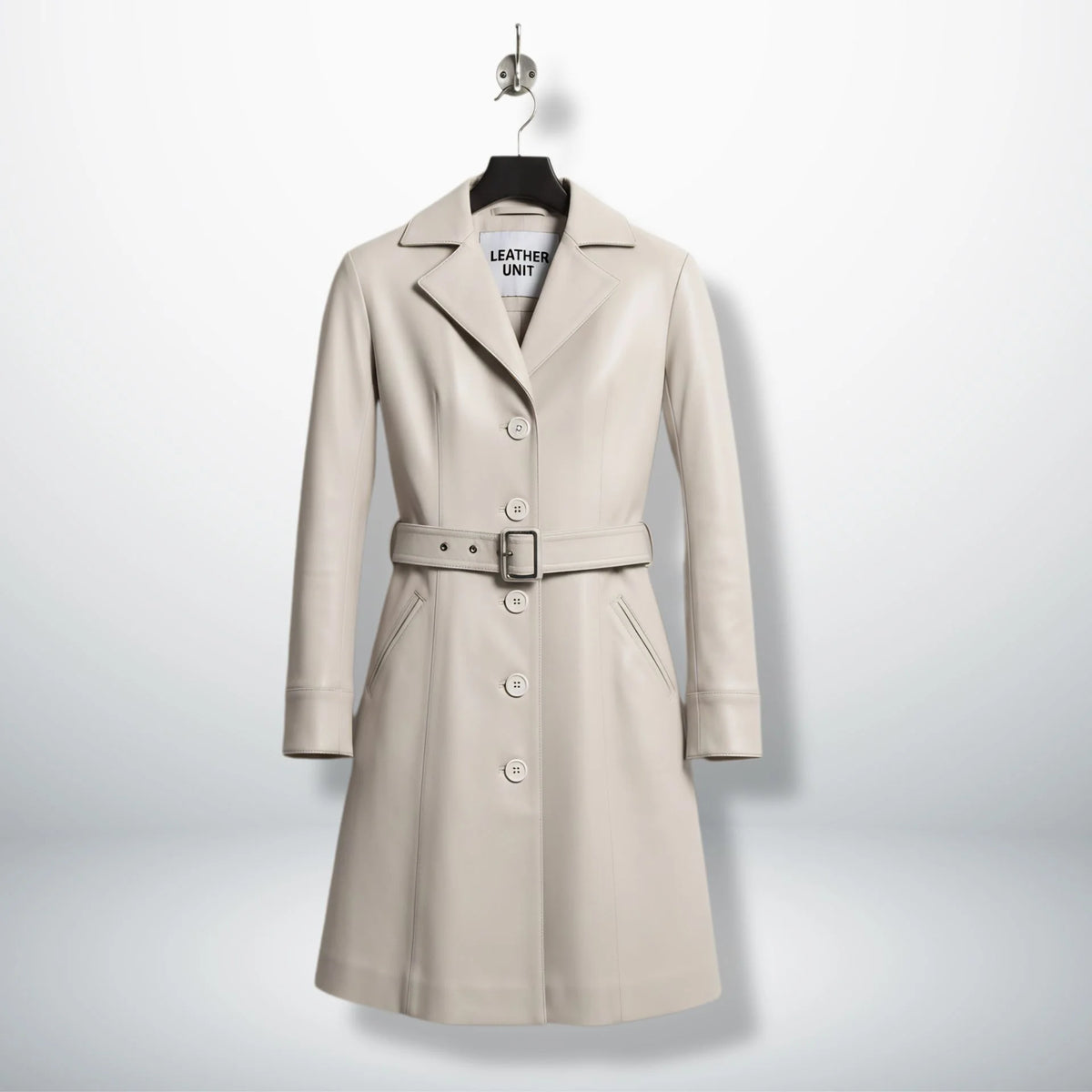Front view of women’s silver leather trench coat with belt by Leather Unit