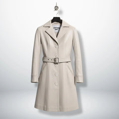 Front view of women’s silver leather trench coat with belt by Leather Unit