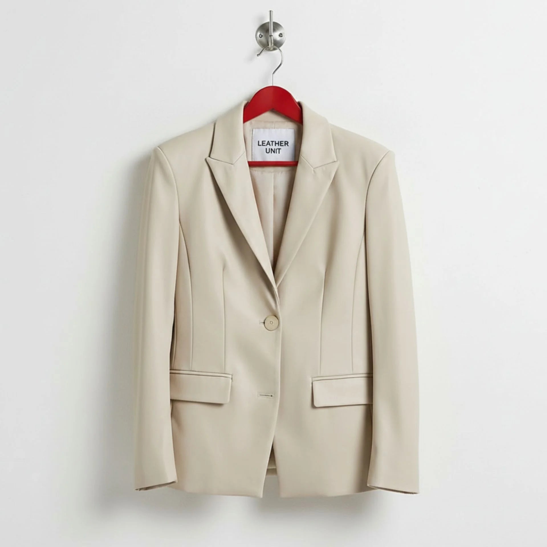 Front view of women’s white leather blazer jacket by Leather Unit