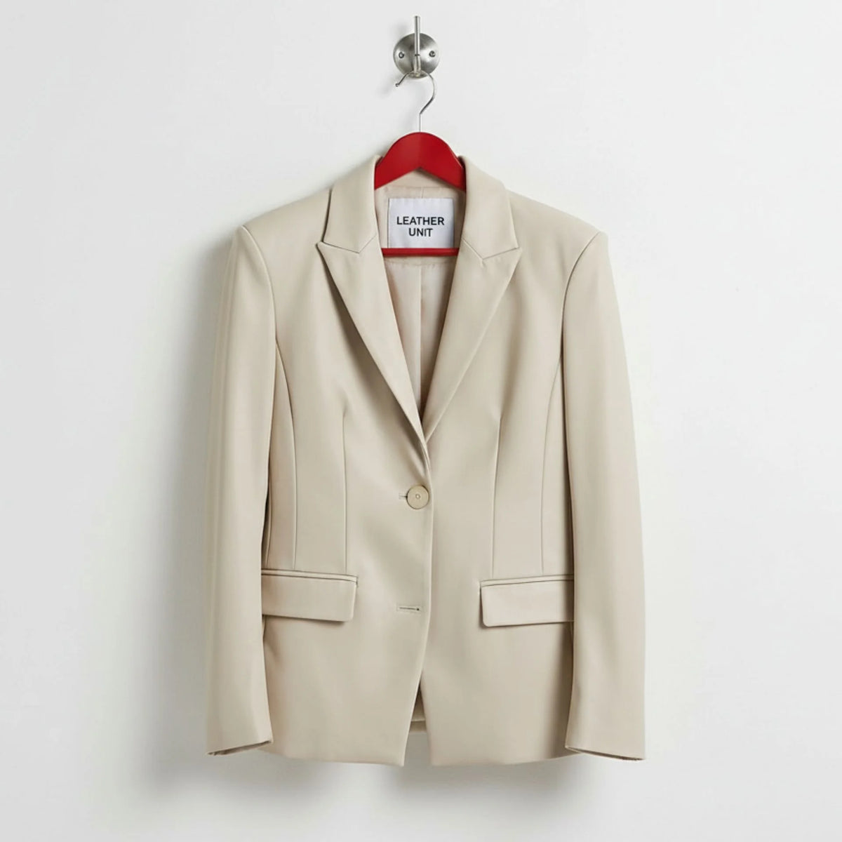 Front view of women’s white leather blazer jacket by Leather Unit