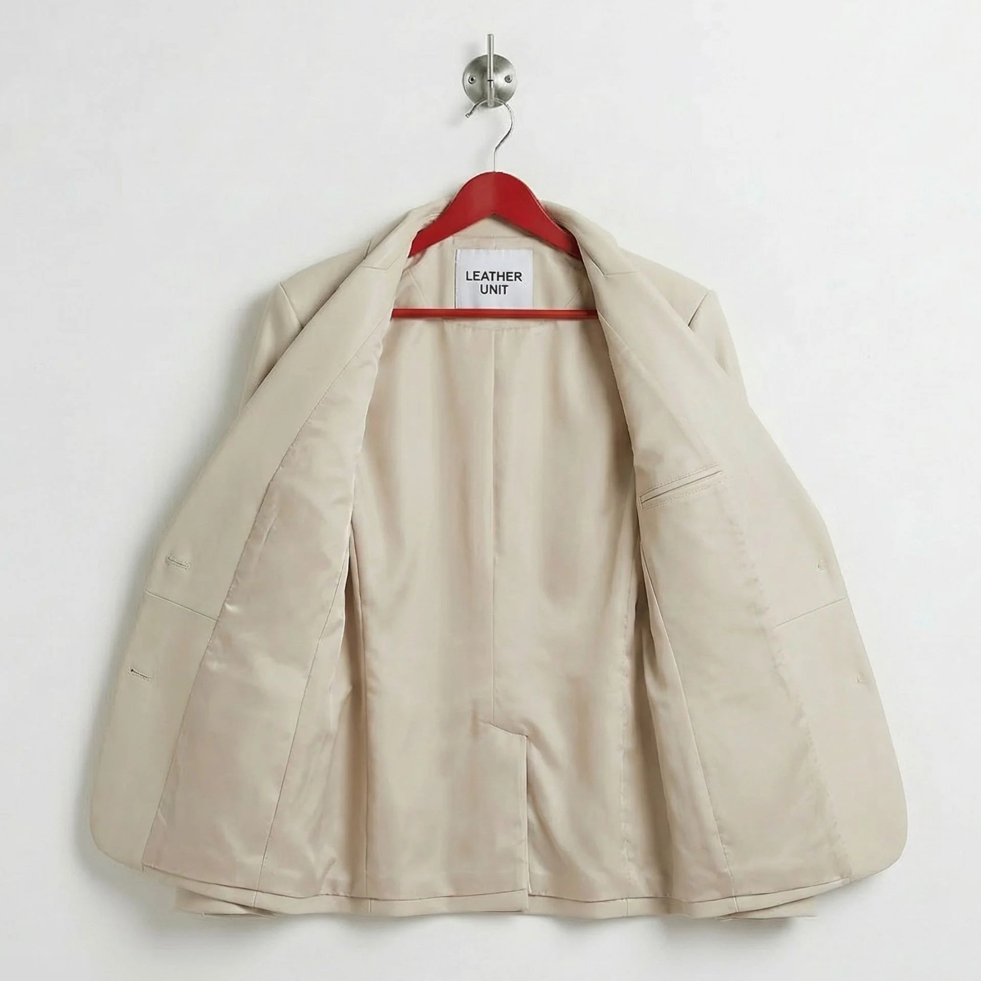 Interior lining of women’s white leather blazer with inner pocket