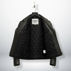 interior of men's leather biker jacket showing black quilted lining.