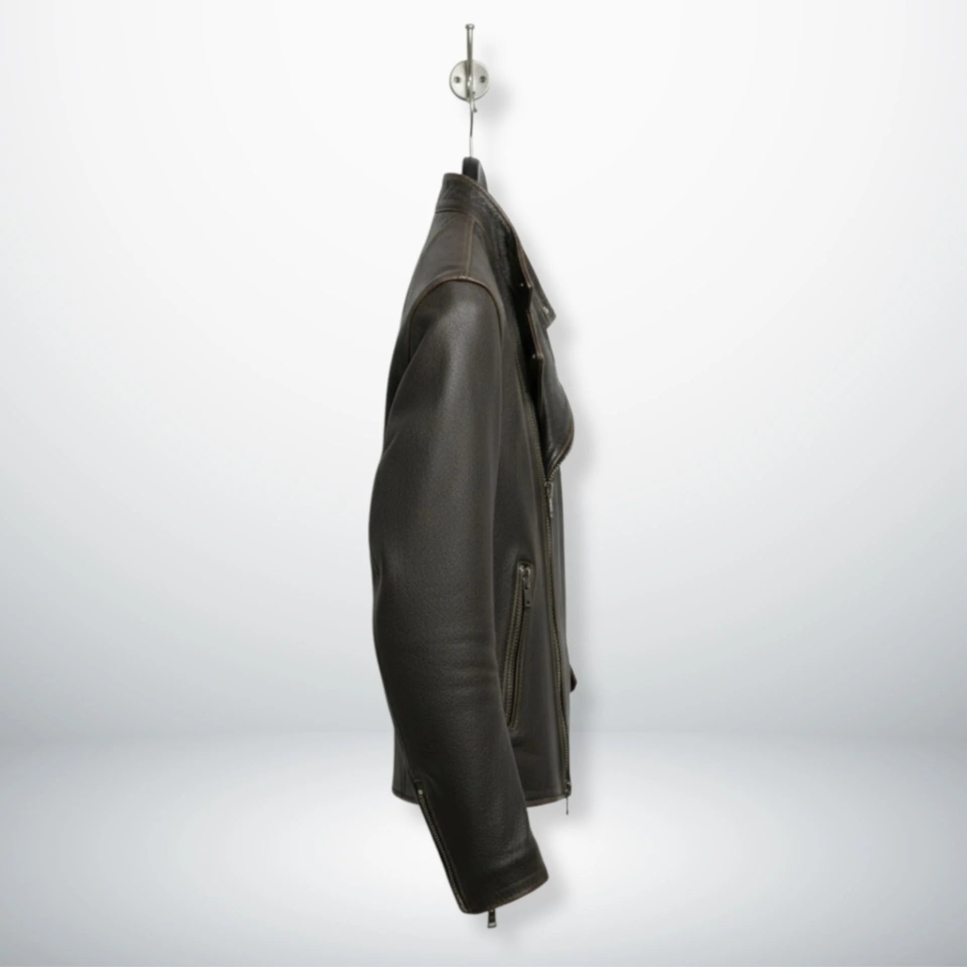 side profile of men's dark brown asymmetrical leather moto jacket.