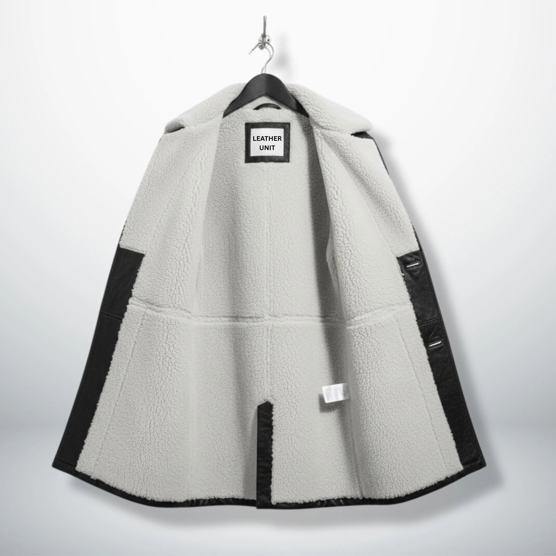 Interior of men's Bane leather coat showing full white shearling lining.