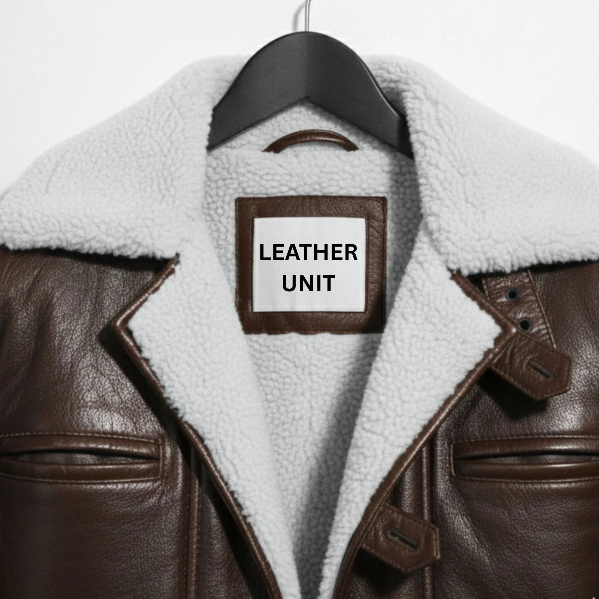Close up of shearling collar and Leather Unit label on dark brown Bane coat.