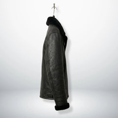 side profile mens black shearling aviator leather jacket on hanger.