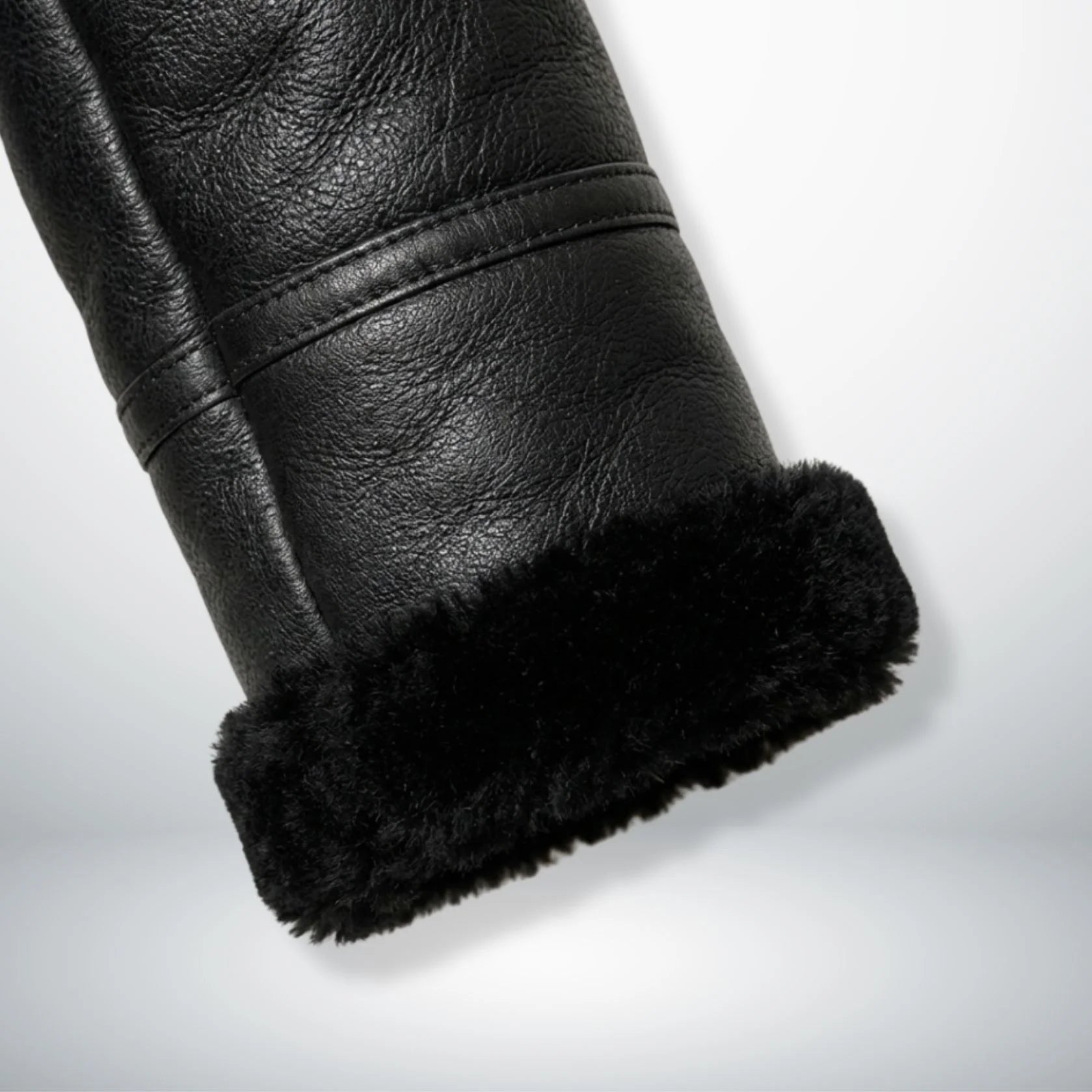 close up faux shearling cuff on mens black b3 aviator leather jacket.