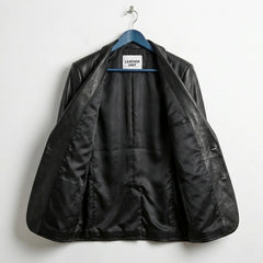 Inside lining of men’s black lamb leather blazer showing inner pockets