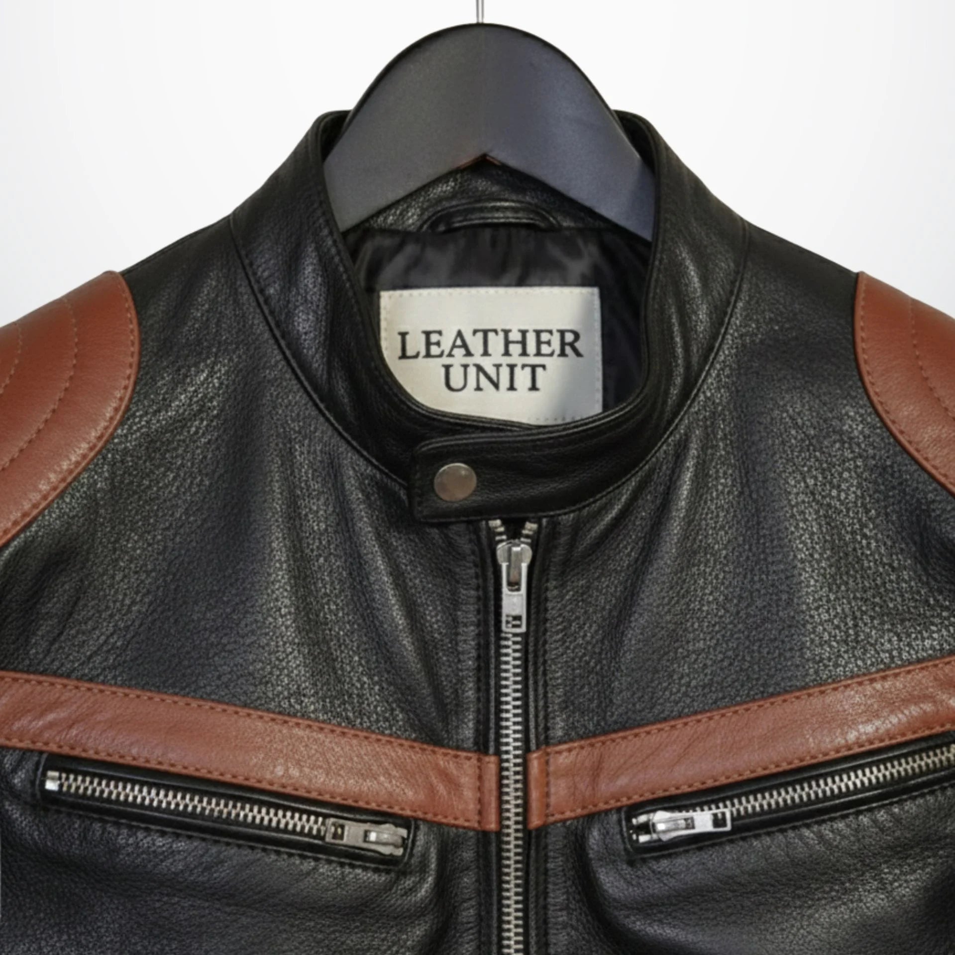close up of snap collar and chest stripes on men's black leather moto jacket by Leather Unit.