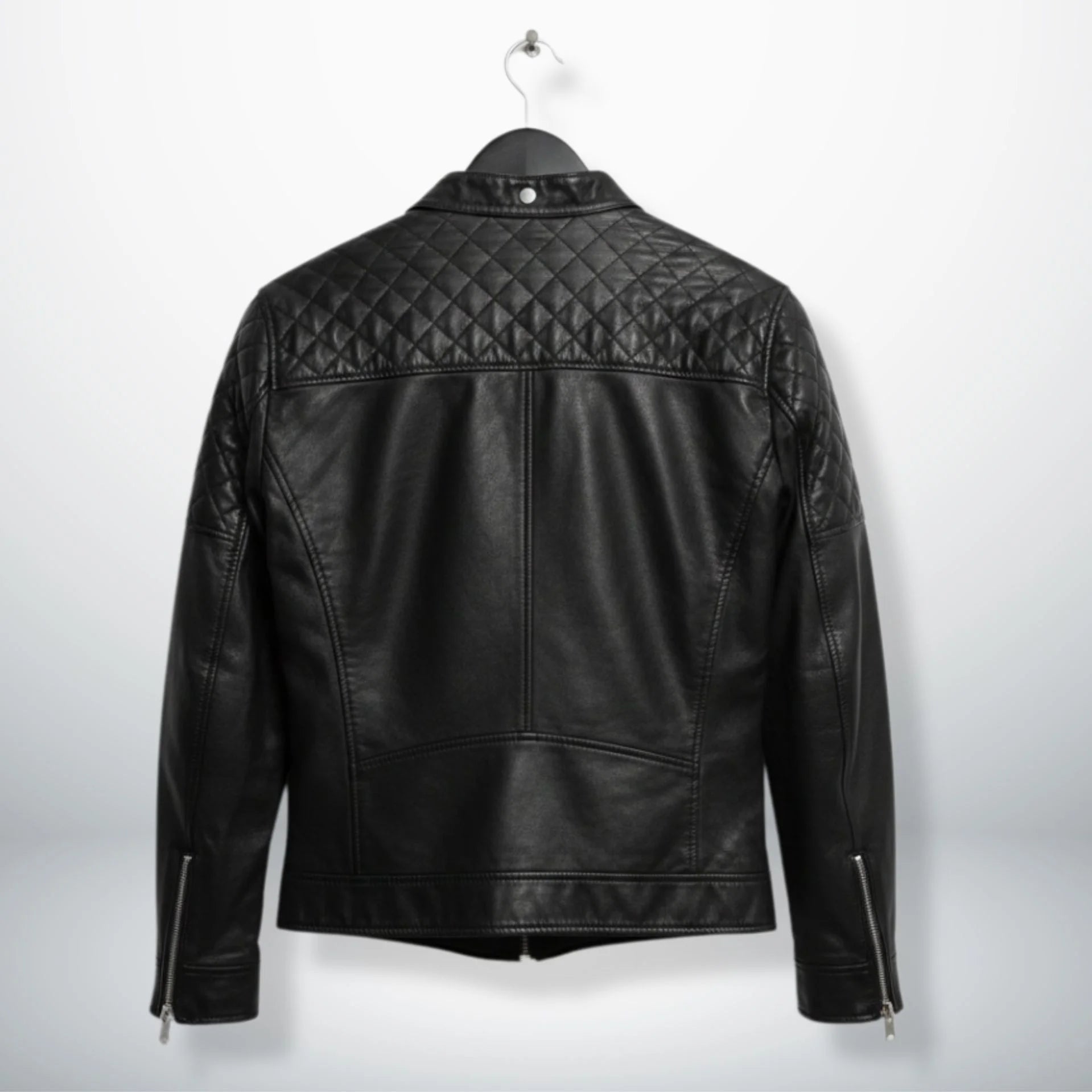 back view of men's black leather motorcycle jacket with quilted upper back.