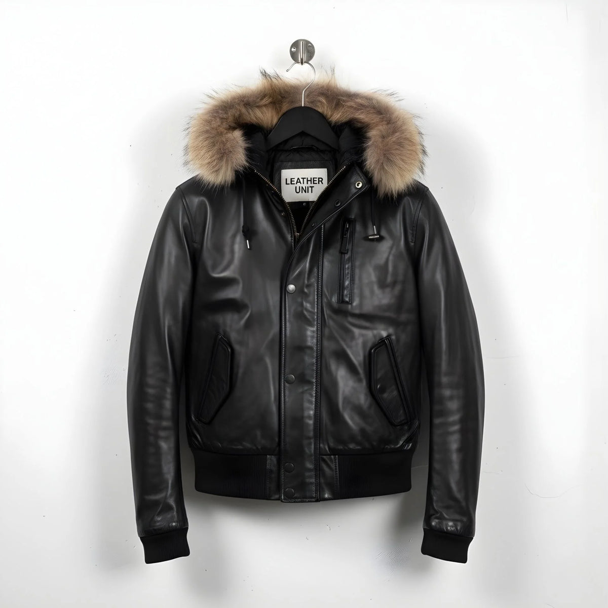 front view of men's black leather bomber jacket with fur hood.