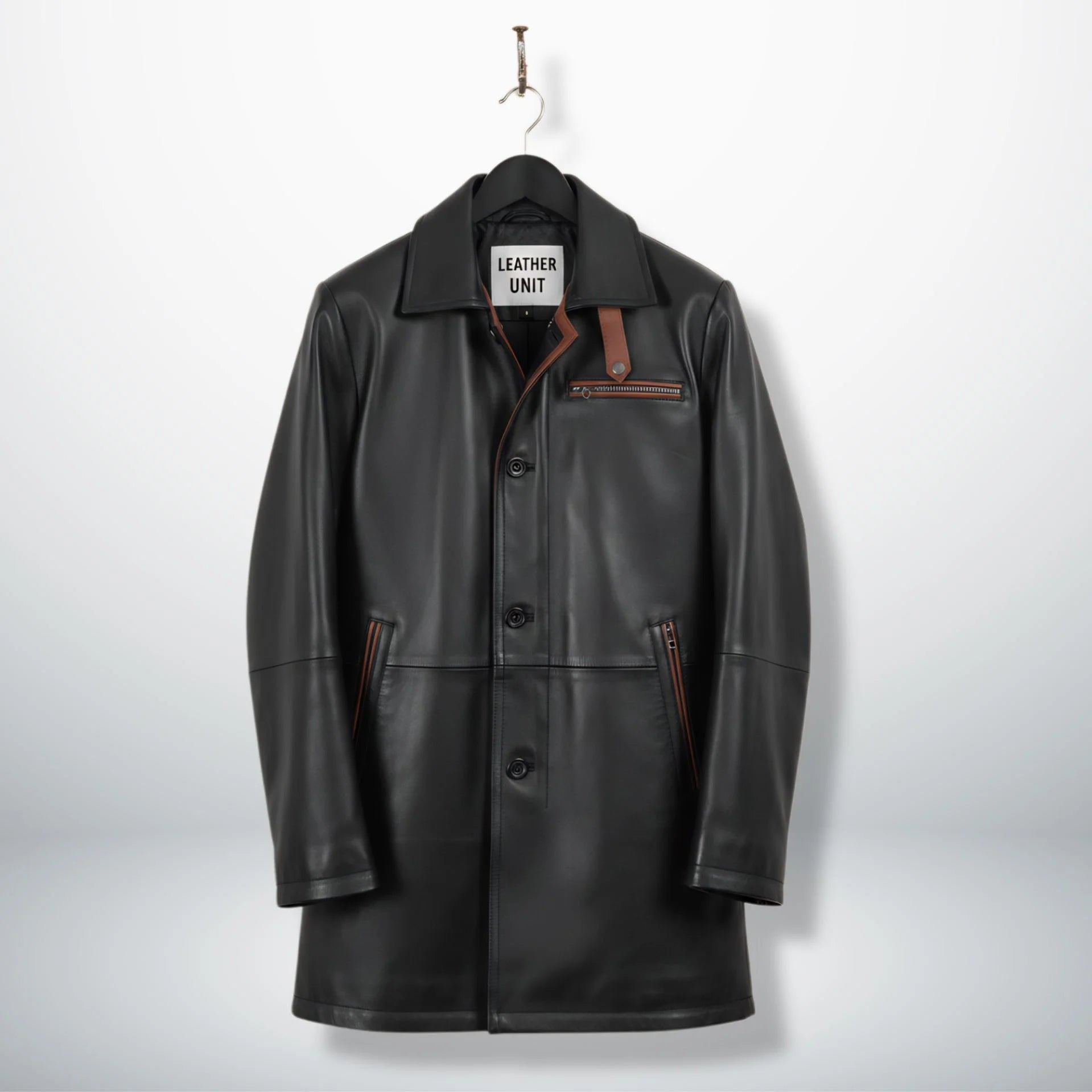Front view of men’s black leather car coat with brown trim by Leather Unit