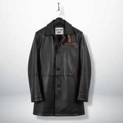 Front view of men’s black leather car coat with brown trim by Leather Unit