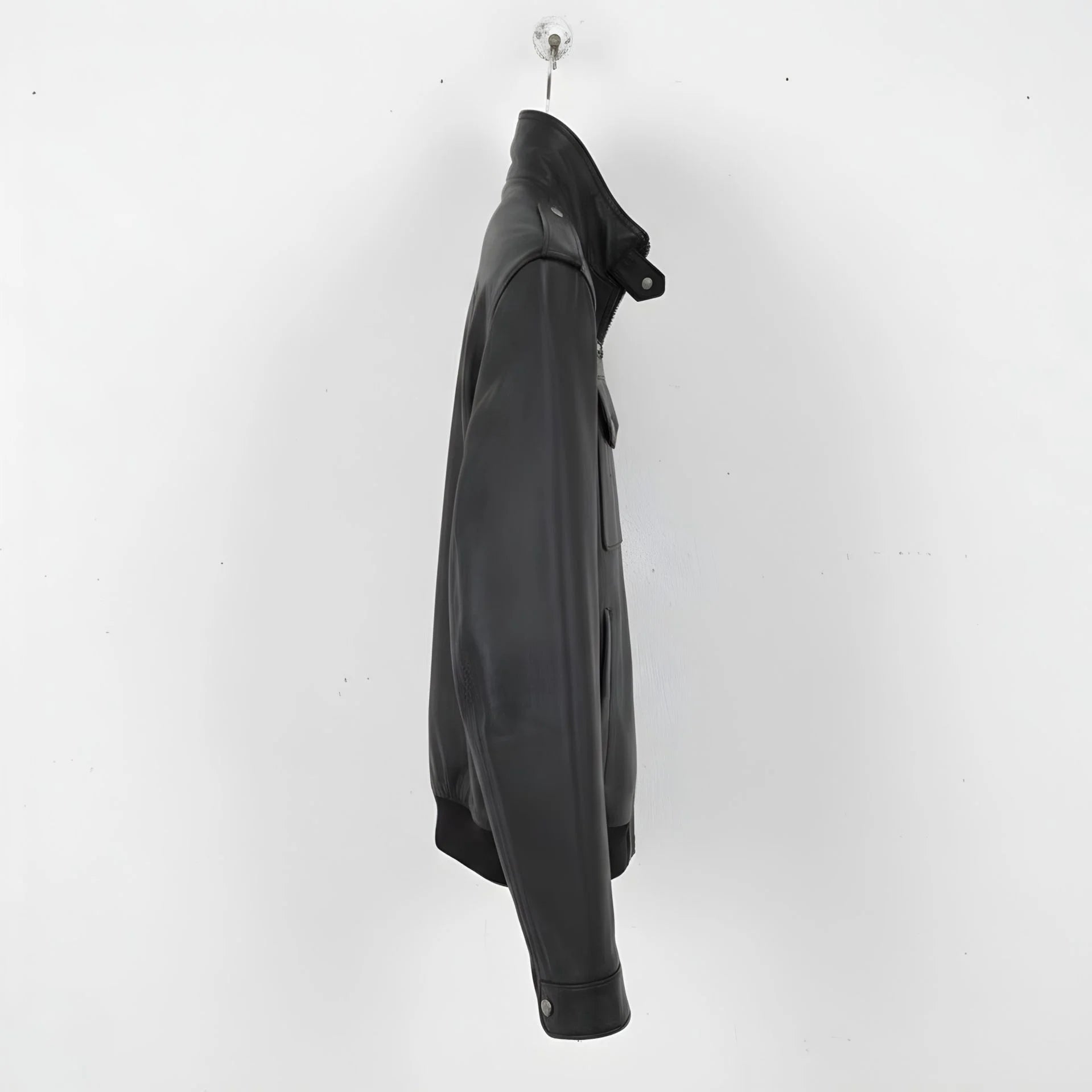 side profile of men's black leather field jacket with band collar.