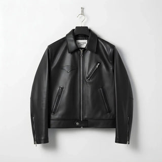 front view of men's black leather jacket with plaid lining and chest zip pocket.