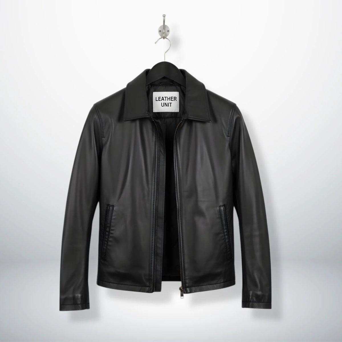 front view of men's slim fit black leather jacket with turn down collar.