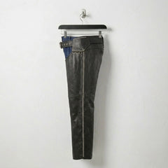 Opposite side view of men's studded black leather motorcycle chaps.