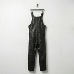 Back view of men's black leather bib overalls showing straight legs and back pockets