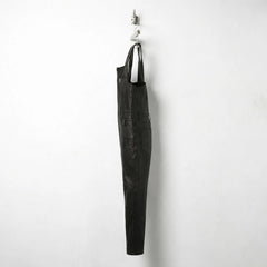 Opposite side view of men's fitted black leather overalls