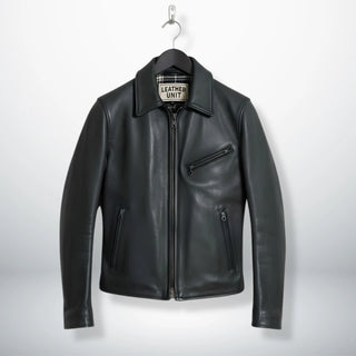 front view of men's black leather rider jacket with shirt collar and zip pockets.