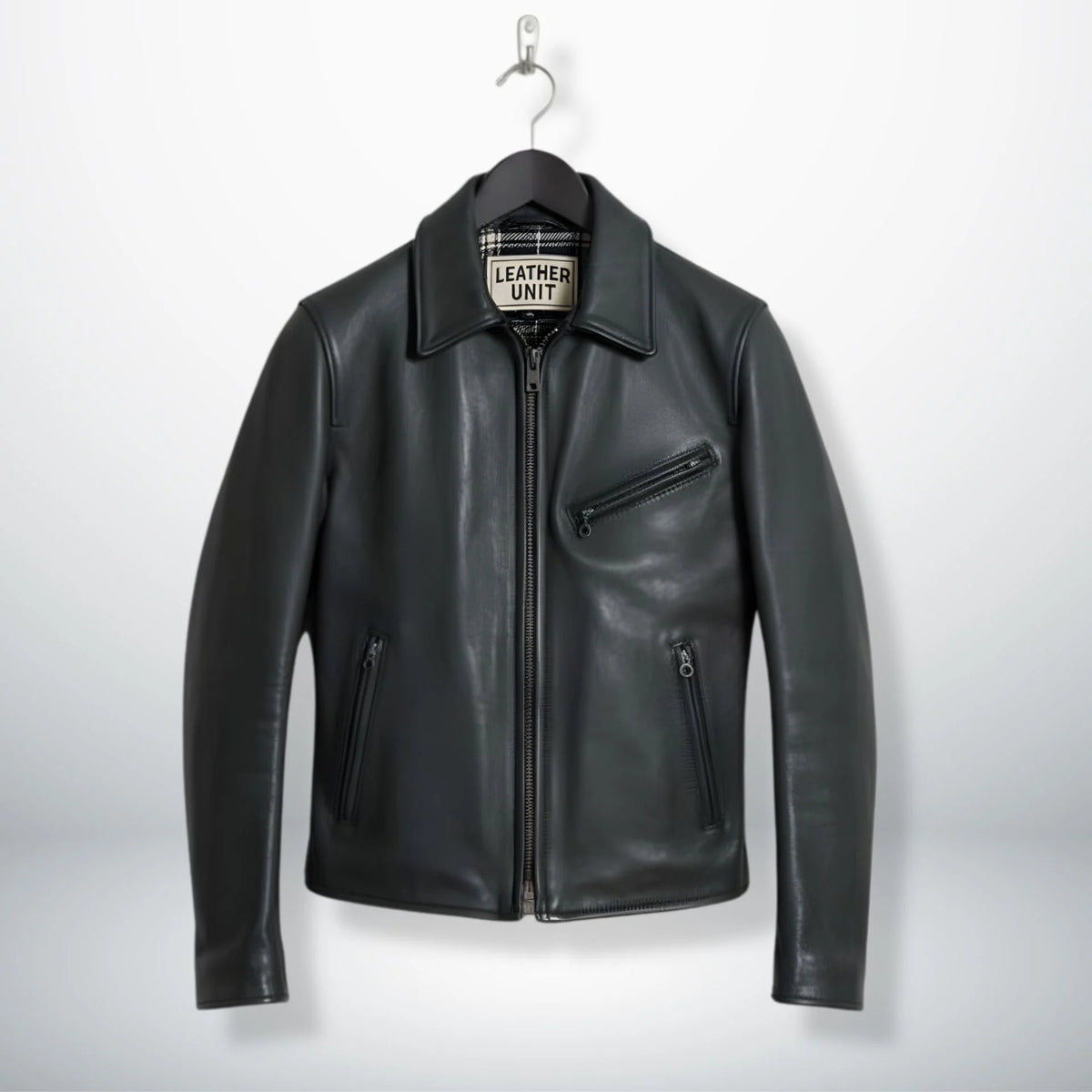 front view of men's black leather rider jacket with shirt collar and zip pockets.
