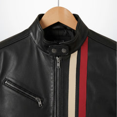 Close-up of stand collar, double snap tab, zip chest pocket and racing stripes on men's black moto jacket.
