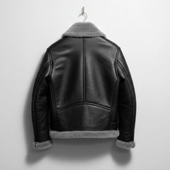 back view mens black leather shearling aviator jacket with grey hem.