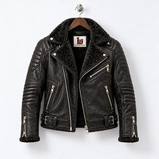 Front hanger view of black sheepskin biker jacket with faux fur collar, asymmetric zip and three zip pockets