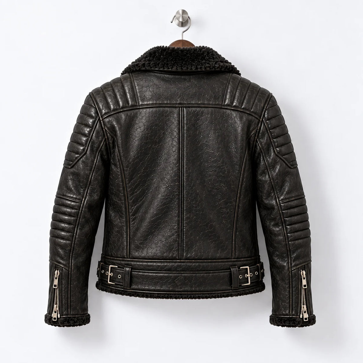 Back hanger view of black leather moto jacket showing quilted shoulders, centre seam and adjustable waist tabs
