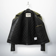interior of men's studded leather jacket showing black quilted lining.