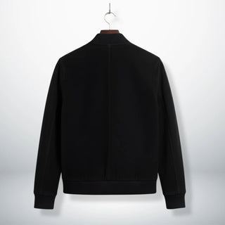 back view mens black suede bomber jacket with ribbed hem.