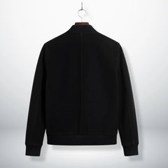 back view mens black suede bomber jacket with ribbed hem.