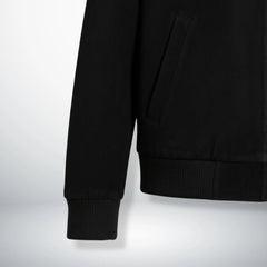 close up cuff and hem on mens black suede bomber jacket.
