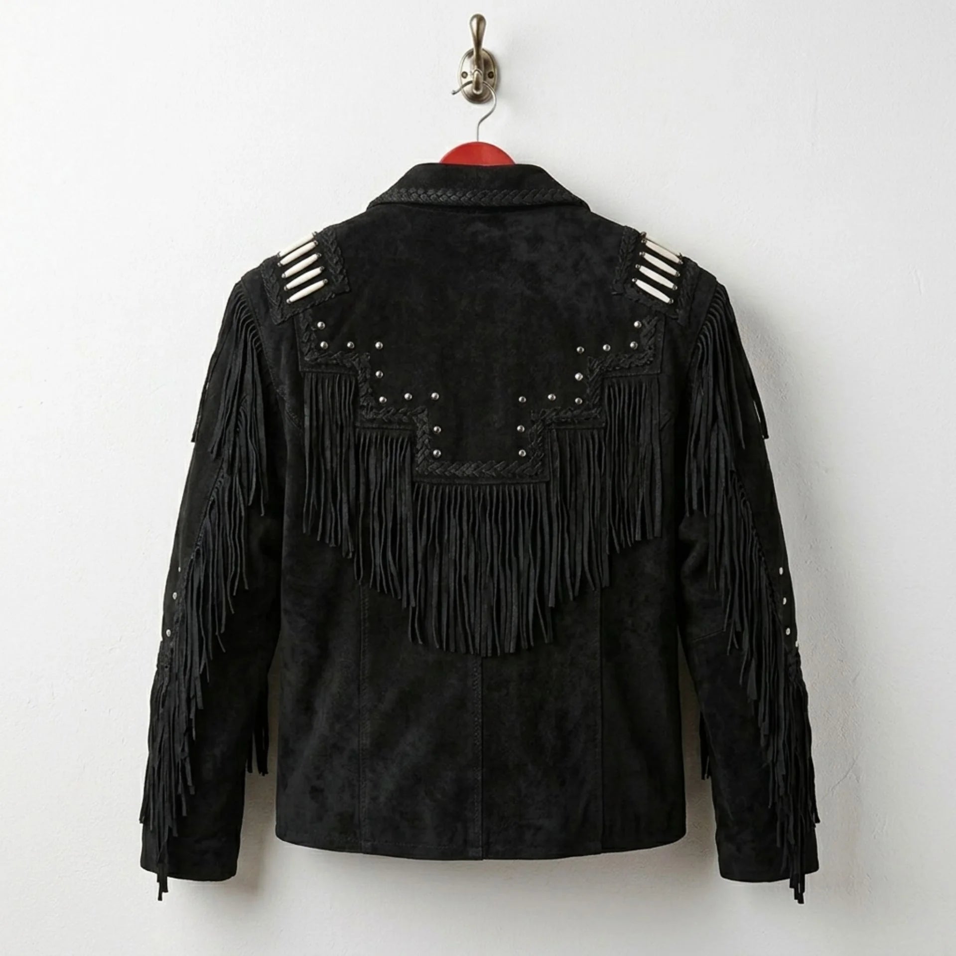 Back view of men's black suede western jacket with long fringe and studs.