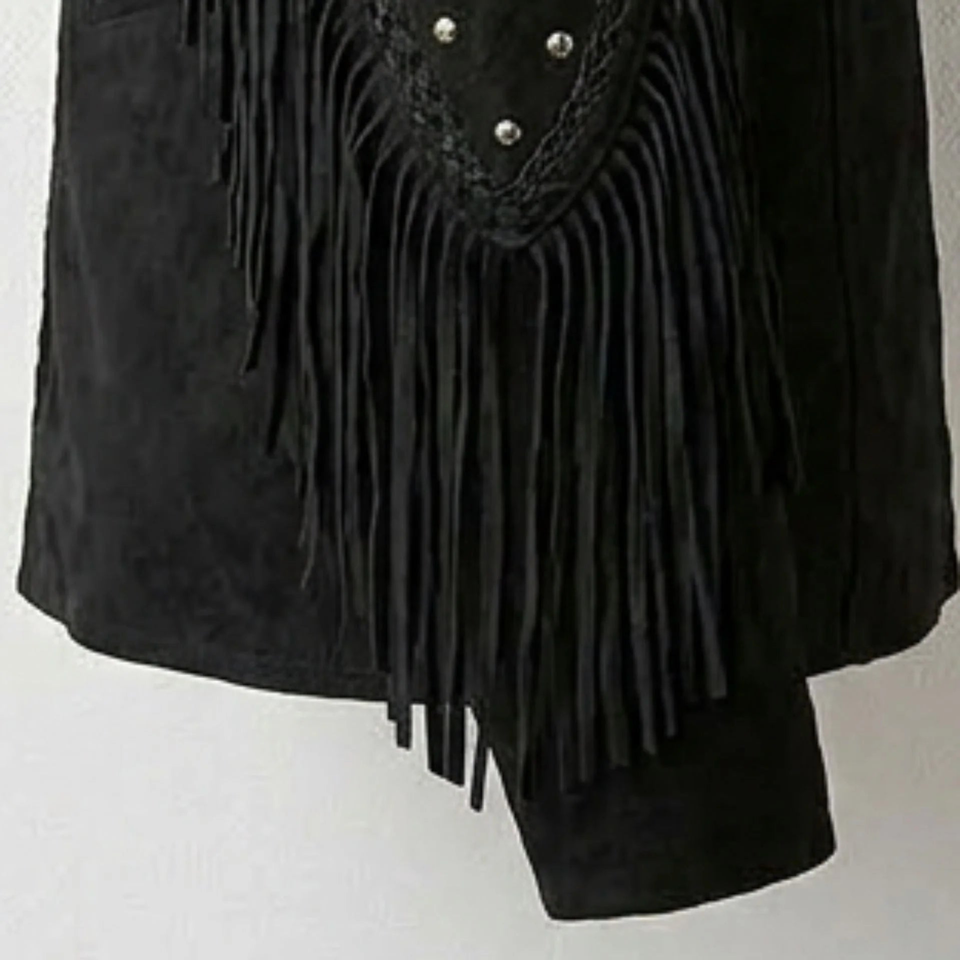 Detail of lower fringe on men's black suede western jacket.