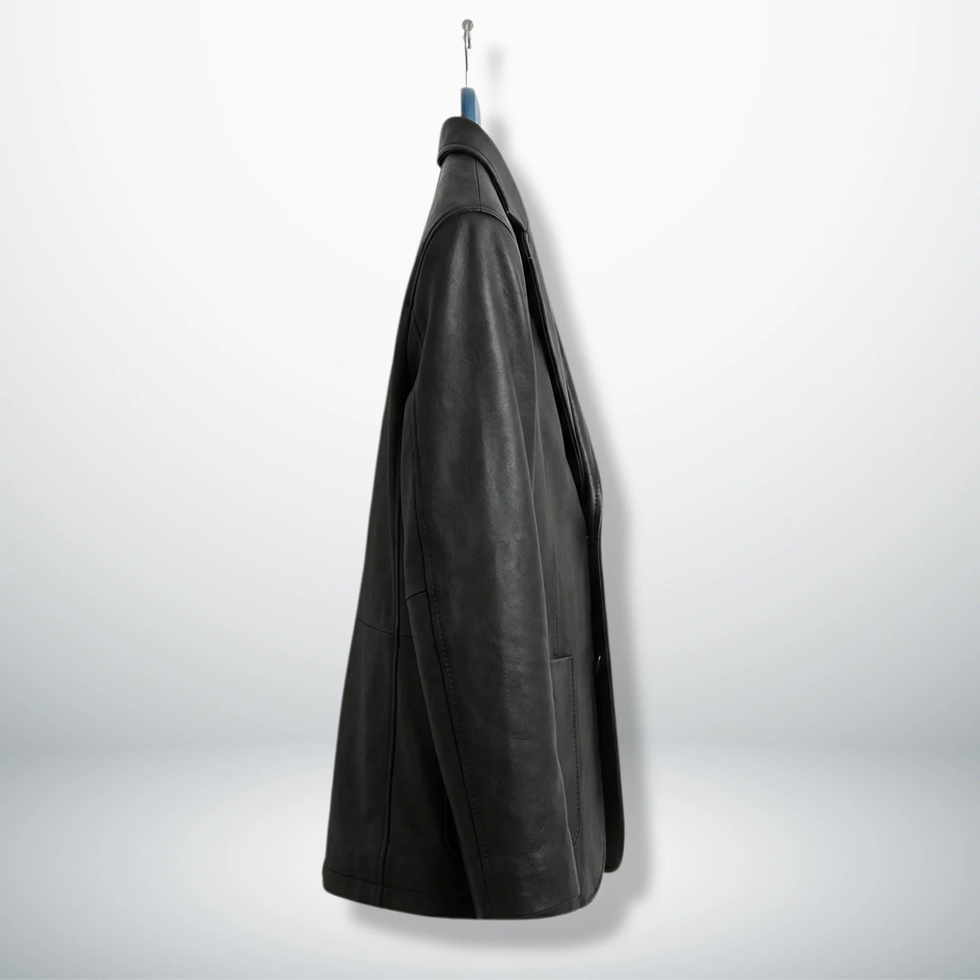 Side profile of men’s black notch lapel leather blazer