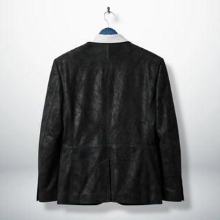 Back view of men’s black leather blazer jacket with tailored seams