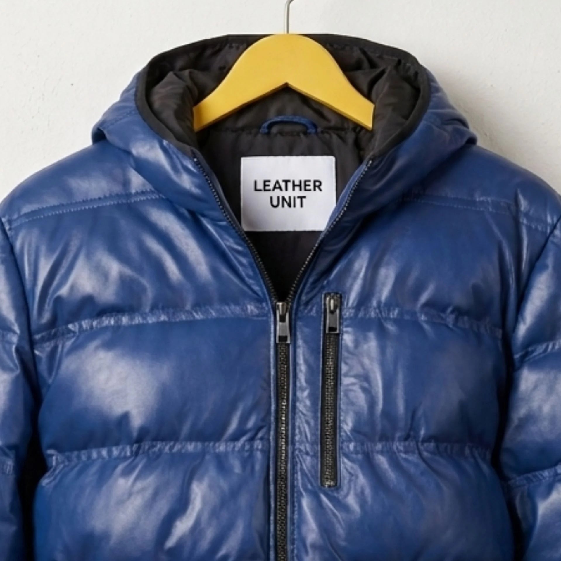Hood and collar close-up of Leather Unit men's blue leather puffer jacket