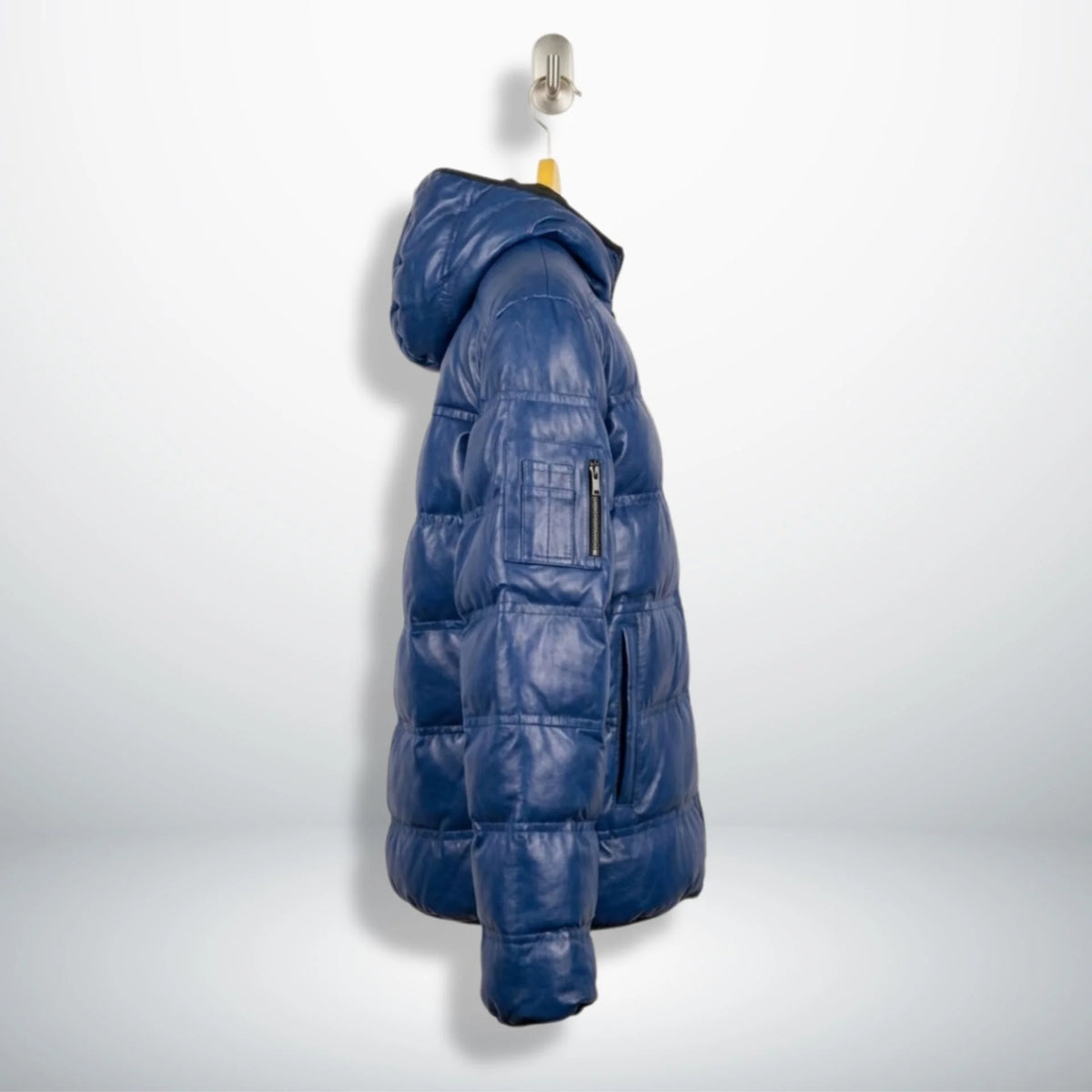 Side profile of premium royal blue hooded leather puffer jacket for men
