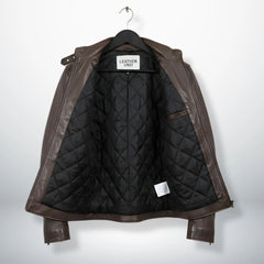 interior of men's brown leather jacket showing black diamond quilted lining.