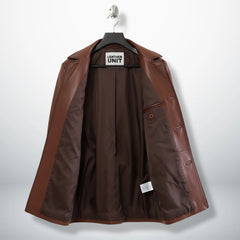 Inside lining of men’s brown leather blazer coat showing inner pocket