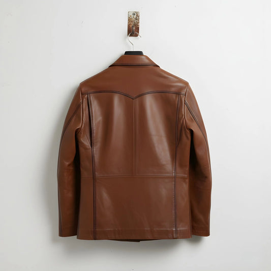 back view of men's cognac brown leather jacket with yoke detail.